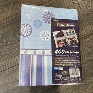 Photo Album. Made by Pioneer. Holds up to 4x6 photos. Slip-in pockets